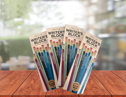 Four packs of “Pencils for The Office” displayed on a wooden table, featuring humorous office-life themed No. 2 pencils.