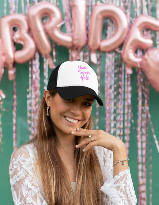 Girl in black and white trucker hat